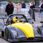 A Radical SR3 driving around a race track for 6th Gear Experience